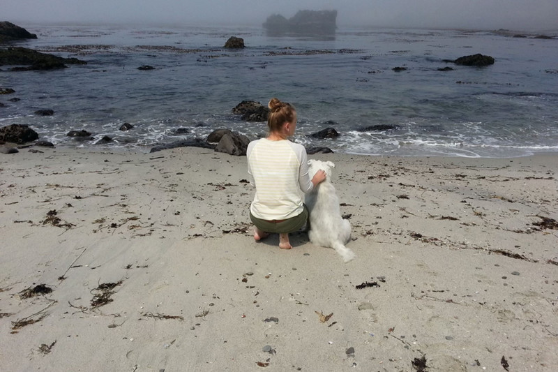 Candy with her human at the beach